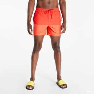 Pánské koupací šortky Calvin Klein Medium Drawstring Swim Shorts Core Logo Block Orange