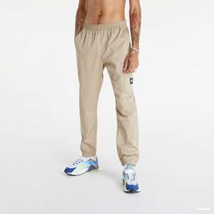 Kalhoty Nike Sportswear Woven Trousers béžové