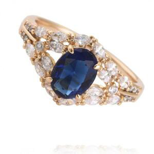 Pozlacený prsten s velkým modrým kamínkem