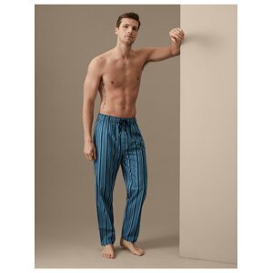 Pruhované pyžamové kalhoty s vysokým obsahem bavlny Marks & Spencer modrá