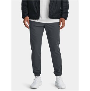 Tmavě šedé pánské sportovní tepláky Under Armour UA Stretch Woven CW Jogger