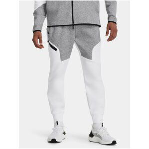 Šedo-bílé sportovní tepláky Under Armour UA Unstoppable Flc Joggers