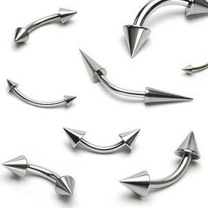 Ocelový piercing stříbrné barvy, zahnutá činka ukončená dvěma kužely - Rozměr: 1,6 mm x 8 mm x 4X4 mm