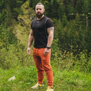 Cihlově oranžové pánské sportovní tepláky Velikost: M