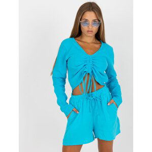 SVĚTLE MODRÉ DÁMSKÉ TRIČKO S ŘASENÍM D70031F11106A5-LIGHT BLUE Velikost: M/L