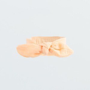 Kojenecká mušelínová čelenka New Baby Leny peach, vel. 68 (4-6m)