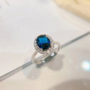 Stříbrný prsten  Melanie se zirkony modrý
