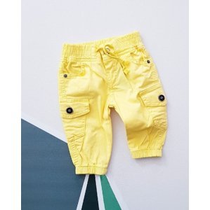 Žluté kapsáčové kalhoty