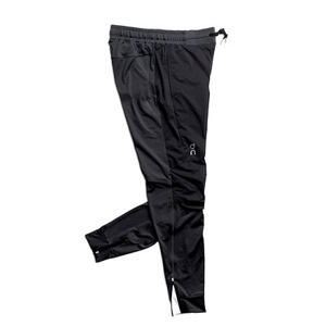 Pánské běžecké kalhoty On Running Pants velikost oblečení M
