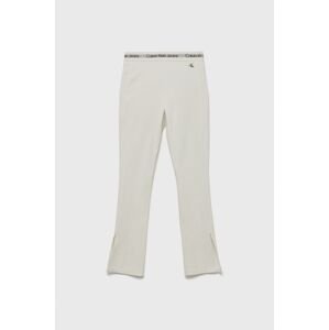 Dětské kalhoty Calvin Klein Jeans bílá barva, hladké