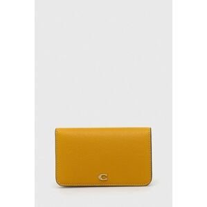 Kožená peněženka Coach žlutá barva