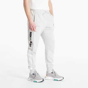 Kalhoty Nike Air Brushed Back Joggers šedé