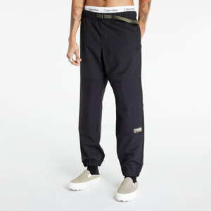 Kalhoty Vans Vans Coastal Loose Tapered Nylon Pant Black